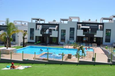 Stueetage lejlighed i Oasis Beach Punta Prima 8 Nº 039 on España Casas