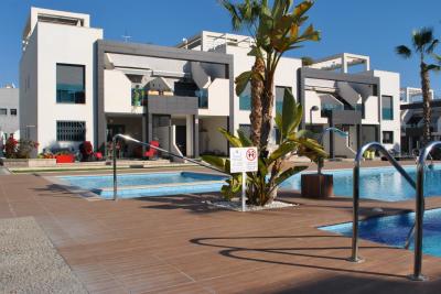 Appartement rez de chaussée à Oasis Beach La Zenia 1 Nº 007 in España Casas